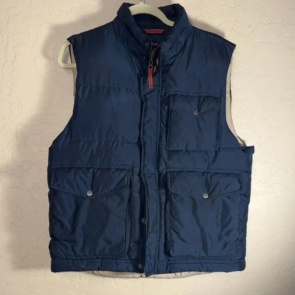 J. Crew men’s blue down filled puff vest size medium.
